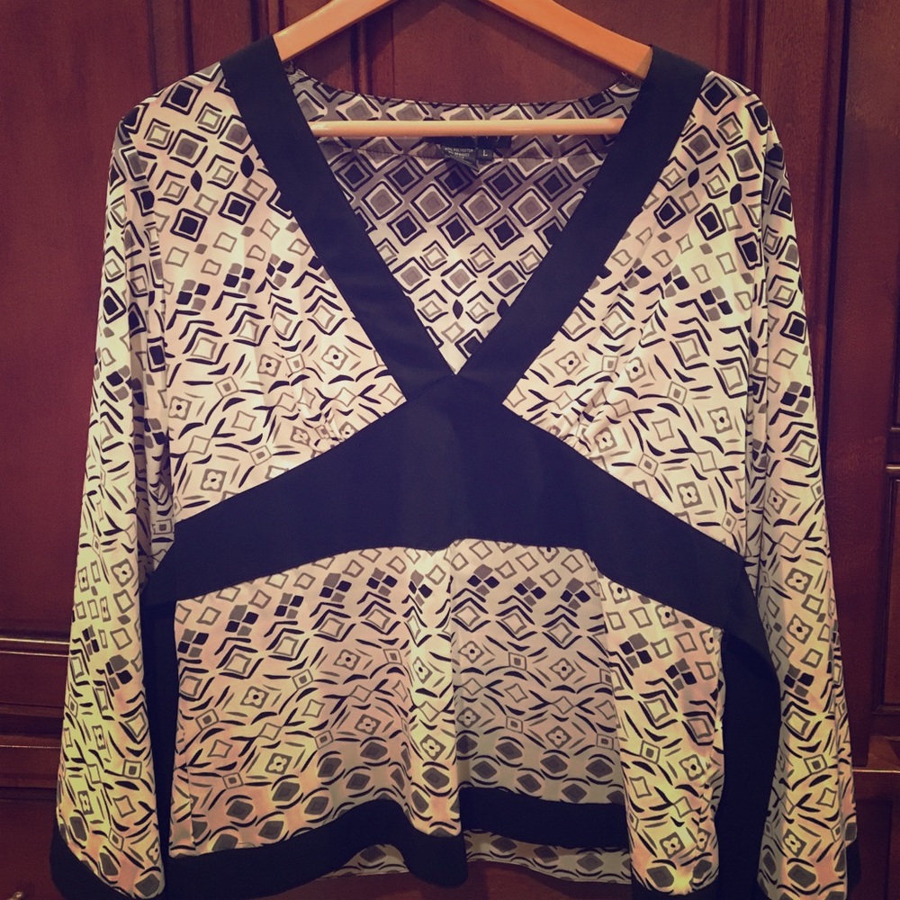 Ninety blouse. Large cuffs. Empire waist.