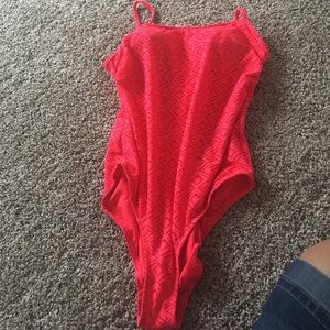 NEVER WORN! Tags still on! One piece swim suit
