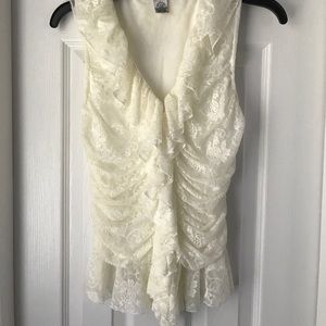 Never worn lace top with ruffle accents!