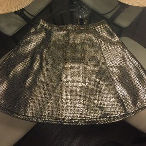 Gold and black mini skirt.