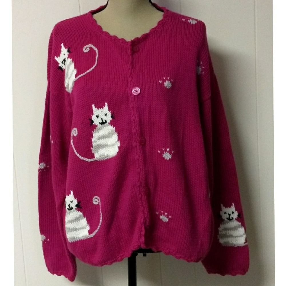 Rey wear pink cardigan with cats