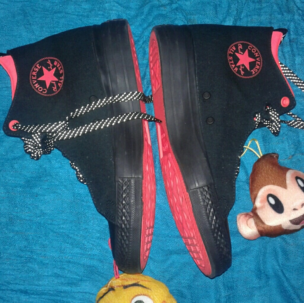 Orange and black hightop Converse size 9.5