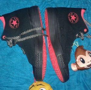 Orange and black hightop Converse size 9.5