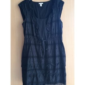 Navy blue, lacy dress, a ribbon to tie.