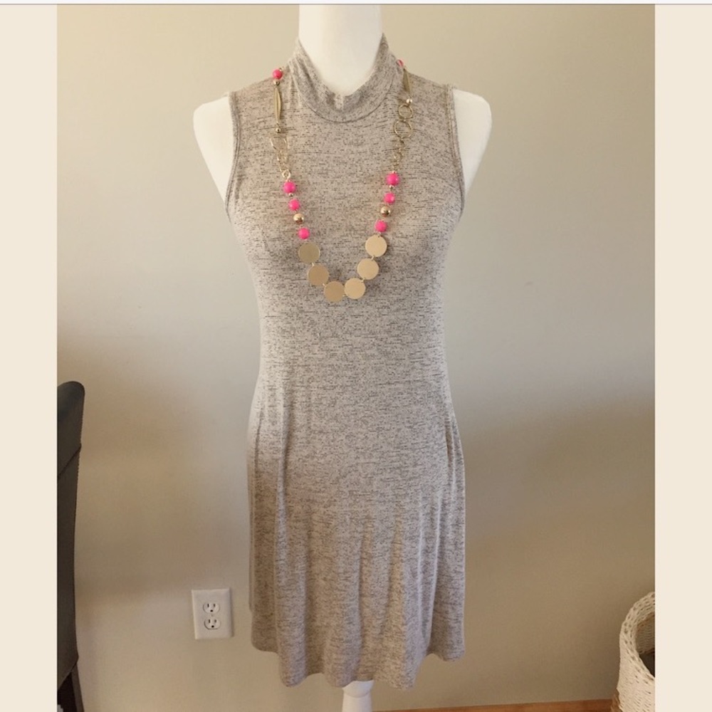 Light grayish dress.