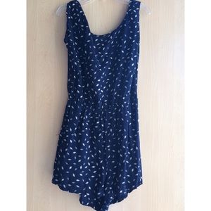 Blue romper, with diamond shape pattern.