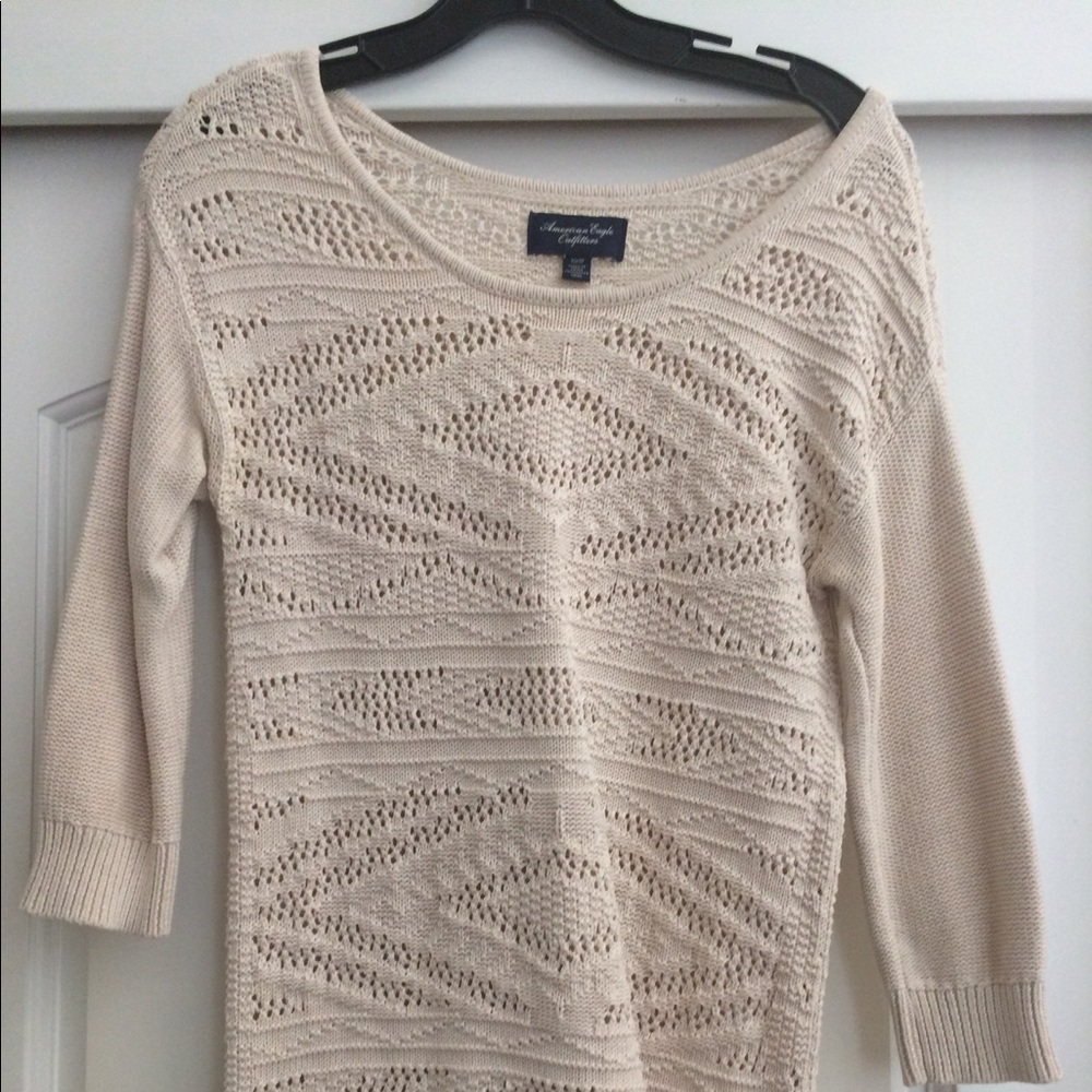 Cream cotton knit 3/4 length sleeve sweater.