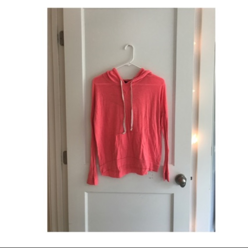 Bright pink hooded American Eagle sweatshirt