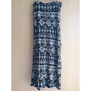 Long black skirt with various brown pattern.