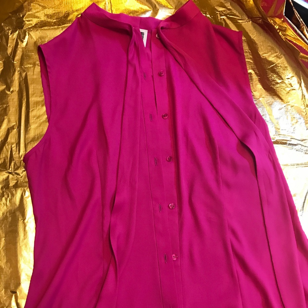 Pink button down silky blouse.