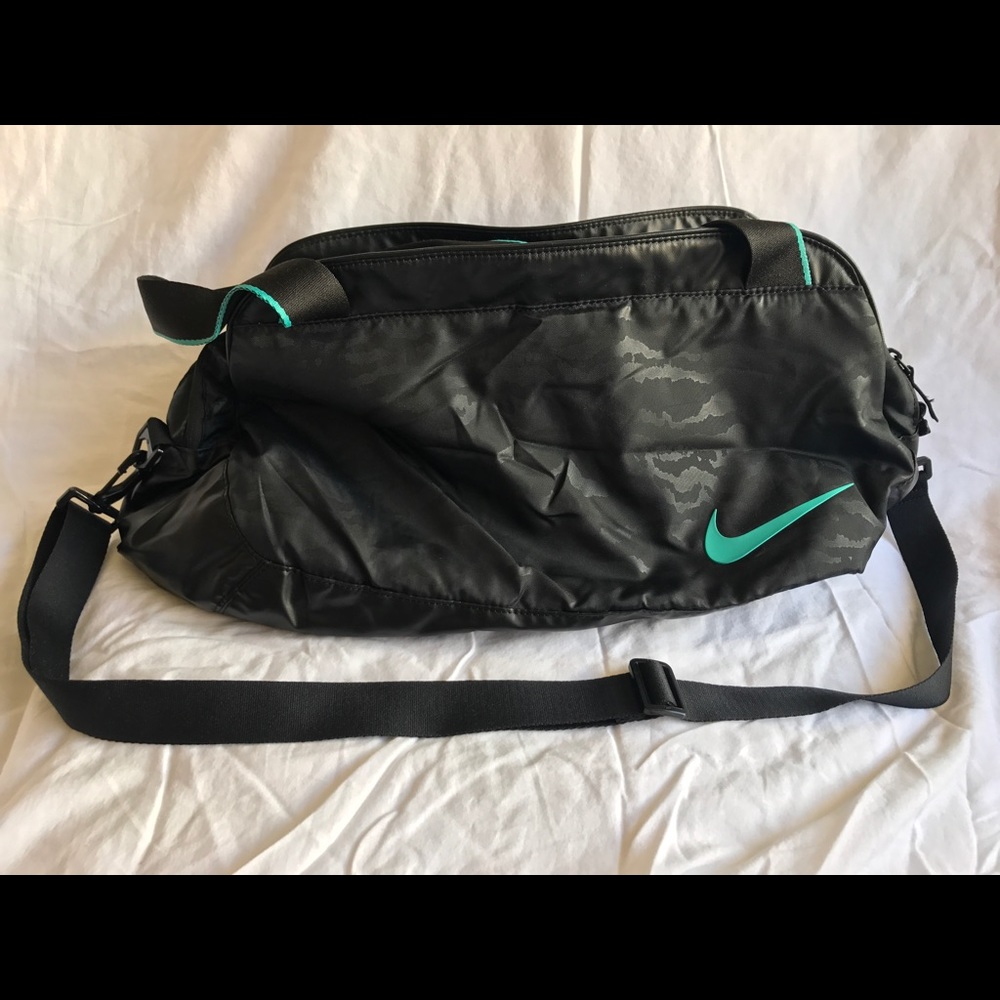 Nike duffel bag in black and turquoise