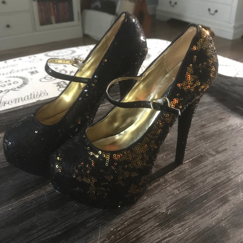Black and gold sequined stilettos
