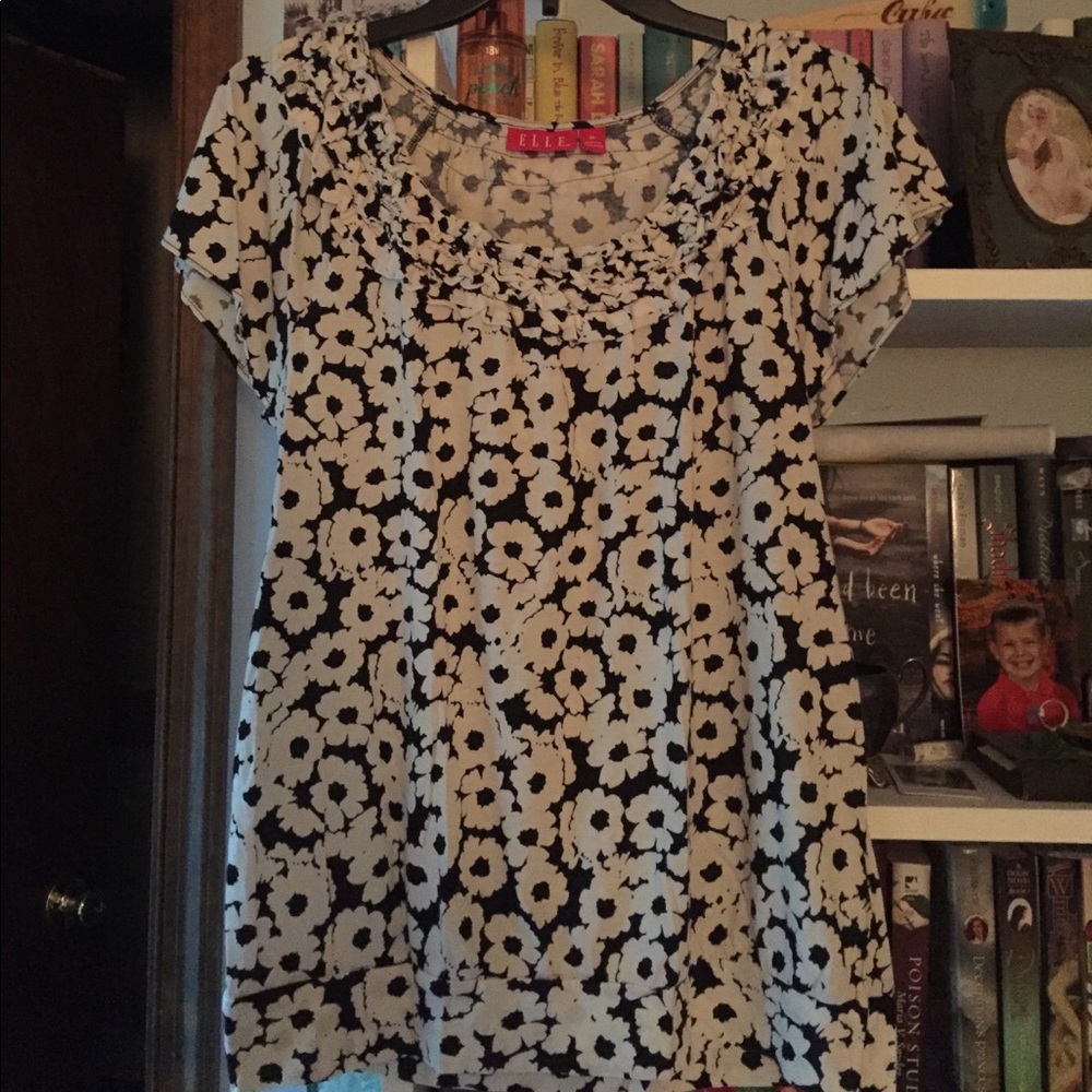 White and black flower work shirt.