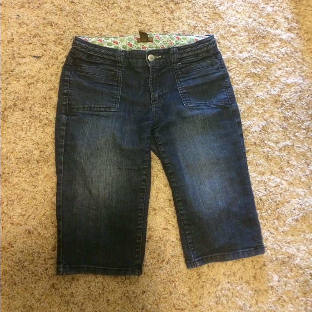 Dark denim right above the knee shorts.