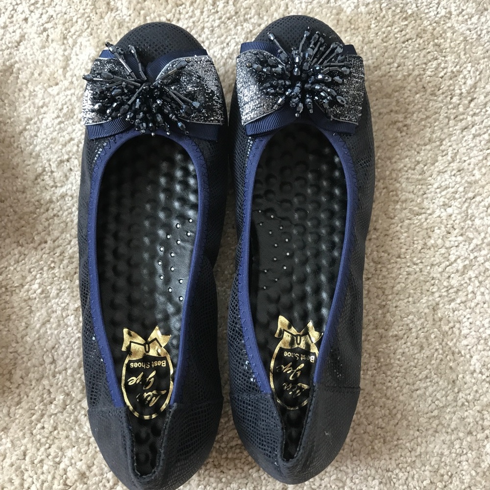 Navy flats with glittery beaded tassels
