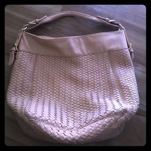 Blush weave hobo bag.