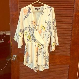 Floral romper(never worn)