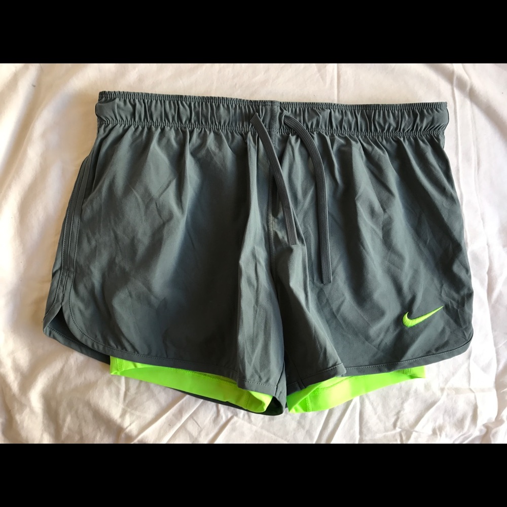 Nike double layer soccer shorts in grey/green