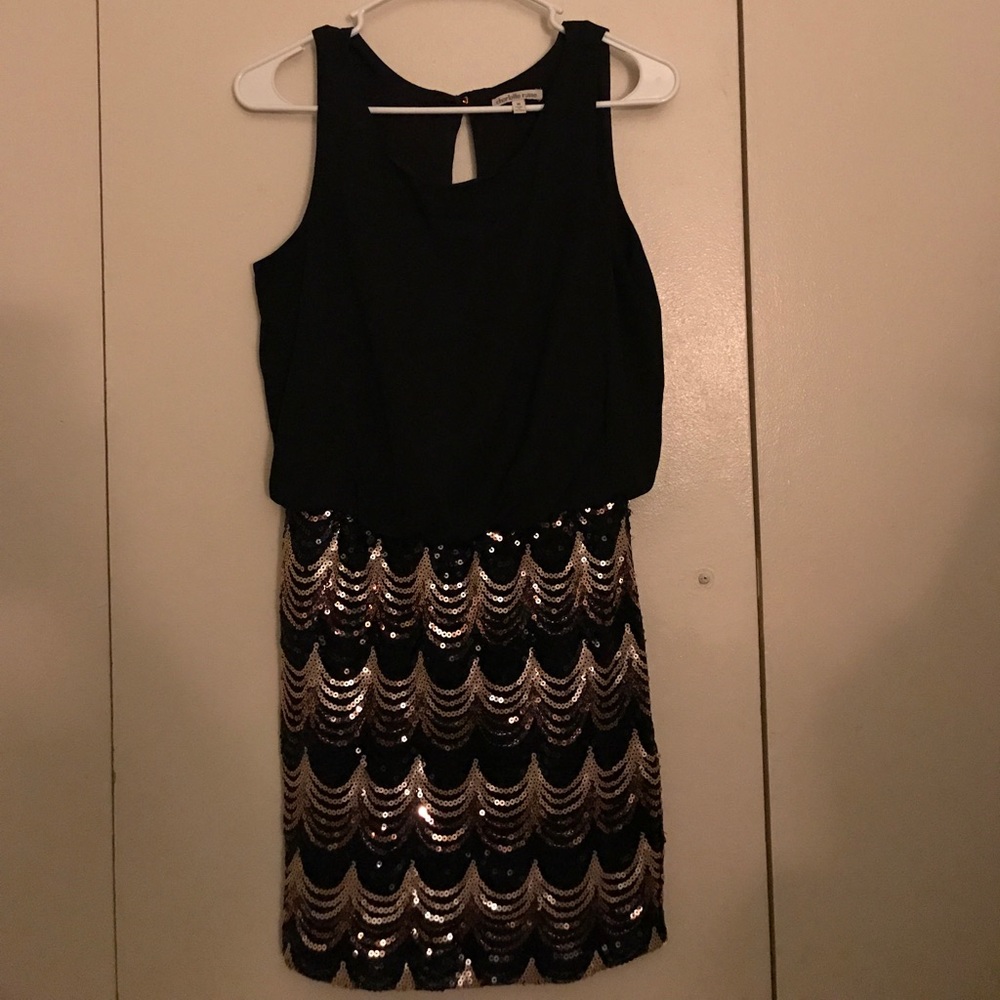 Black and sequined party dress