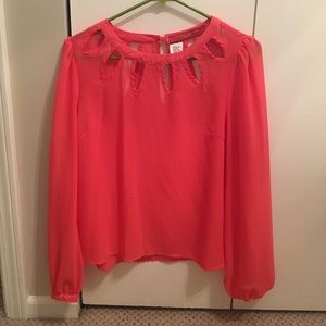 Akira coral top