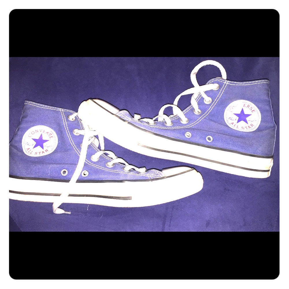 Blue high top converse tennis shoes
