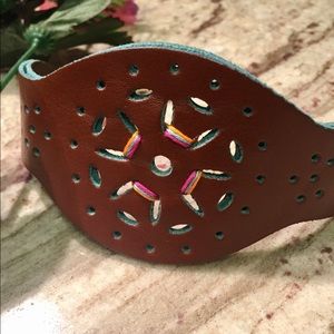 Brown leathery bracelet with cute designs.🌸