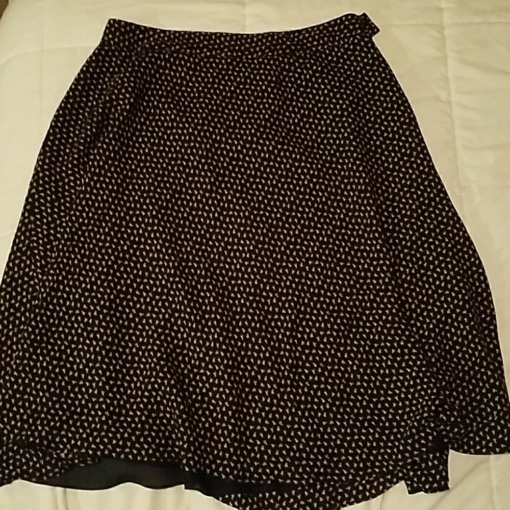 A-line skirt.  black with bright pink flowers