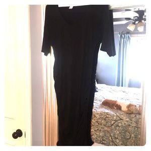 Black, body-hugging cotton dress