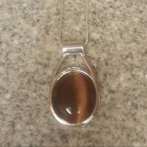 Silvertone necklace with brown pendant