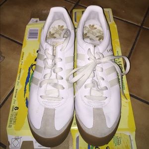 Adidas White sneakers.