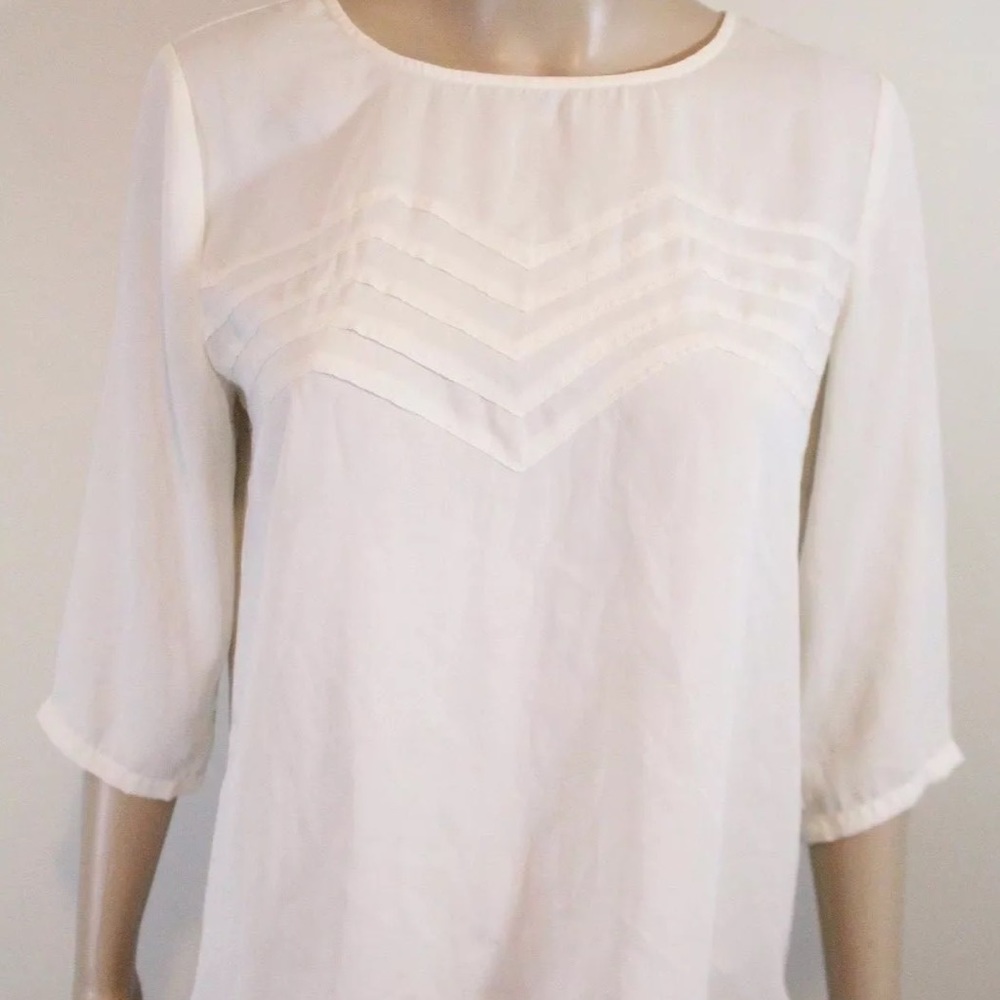 Anthropologie ivory zigzag pleat peasant blouse