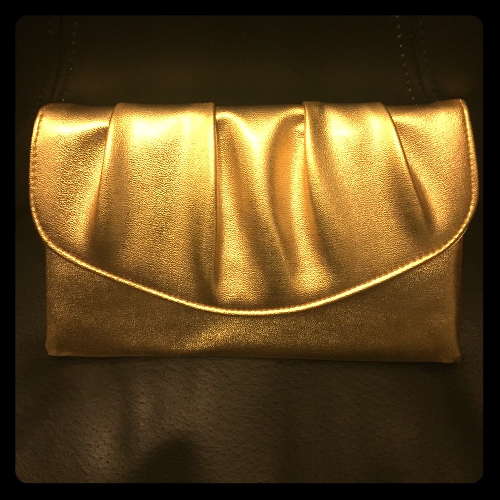 Gently used cute clutch bag.