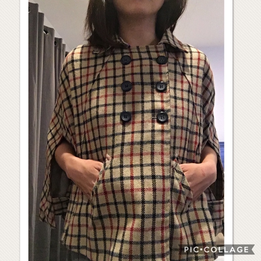 Cape/ poncho style jacket