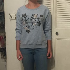 Light blue sweater