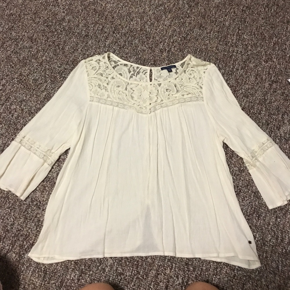 Cream top with lace and button details