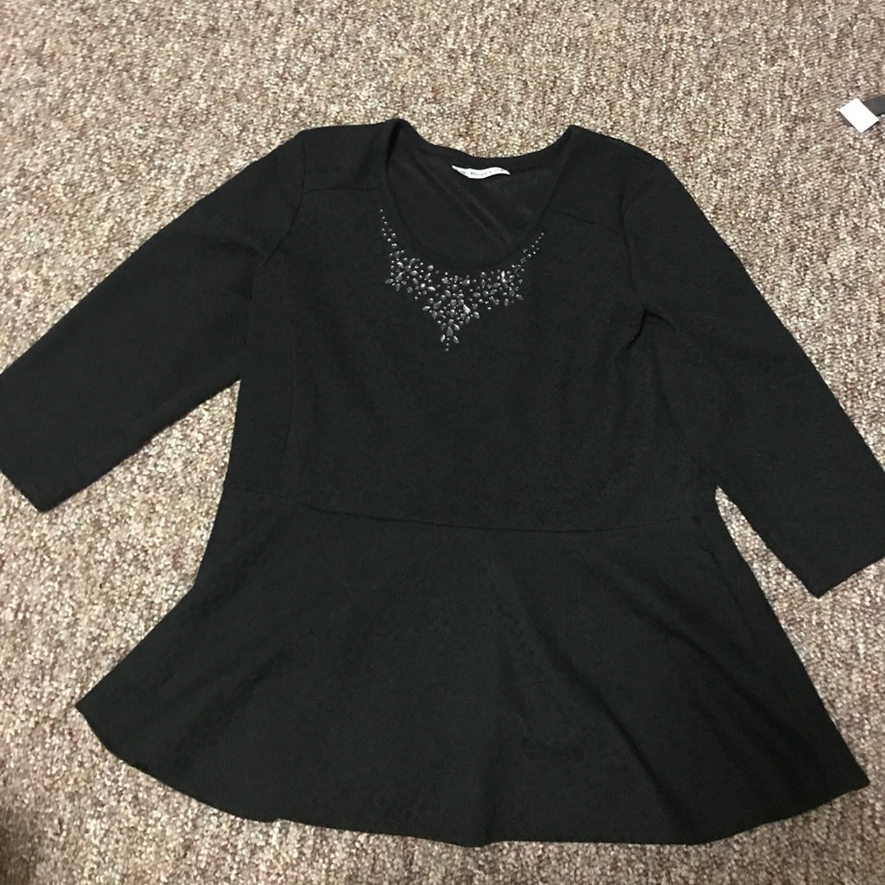 Black peplum top with jeweled collar