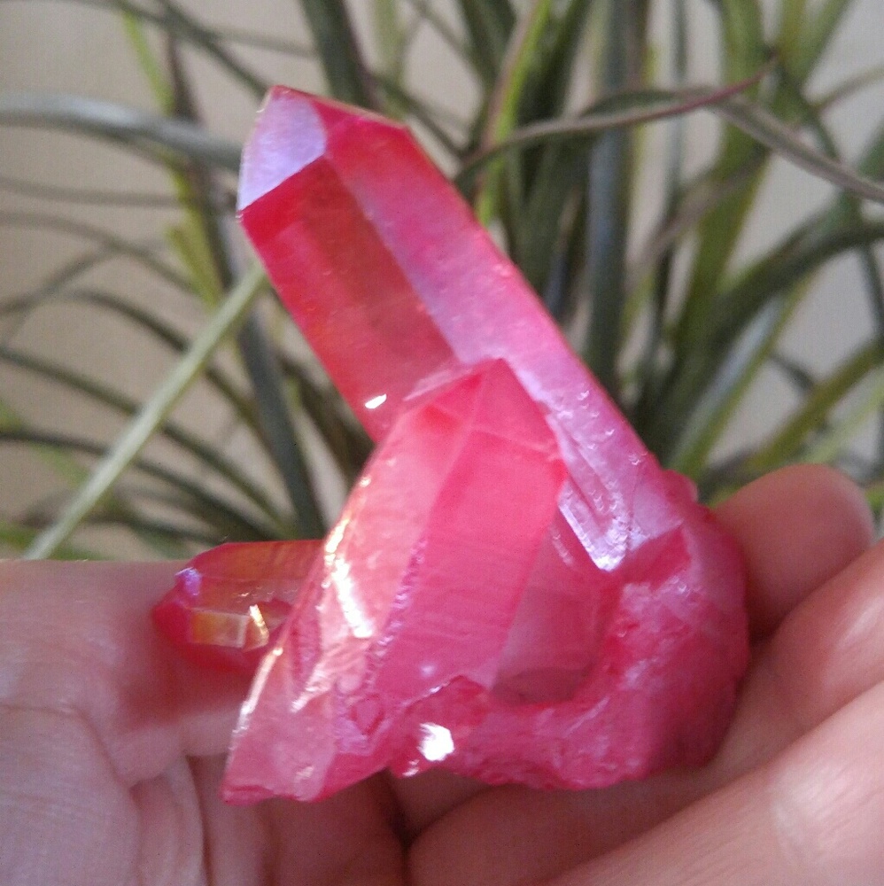 Melon red aura quartz crystal