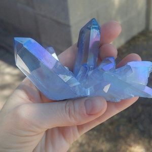 Powder blue aura quartz crystal
