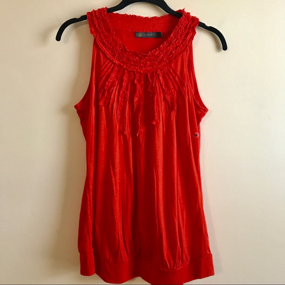 Lovely Ruffle Front Tank with banded hem.