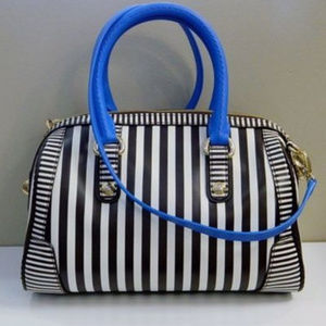 Henri Bendel barrel bag with Blue Accents