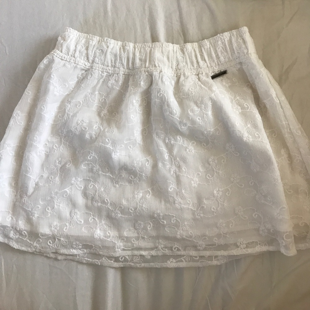 White eyelet mini skirt