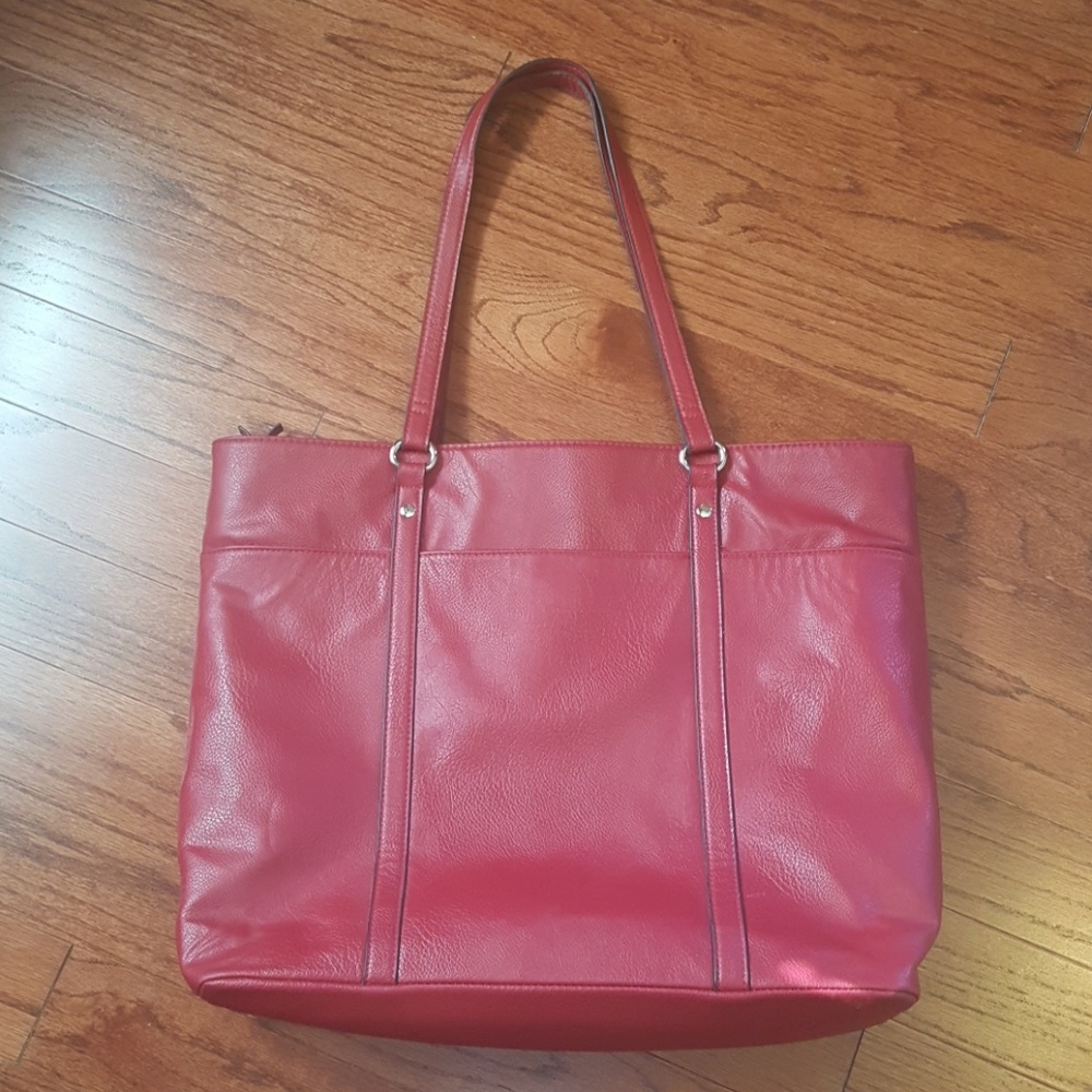 Gorgeous red tote with silver Hardware.