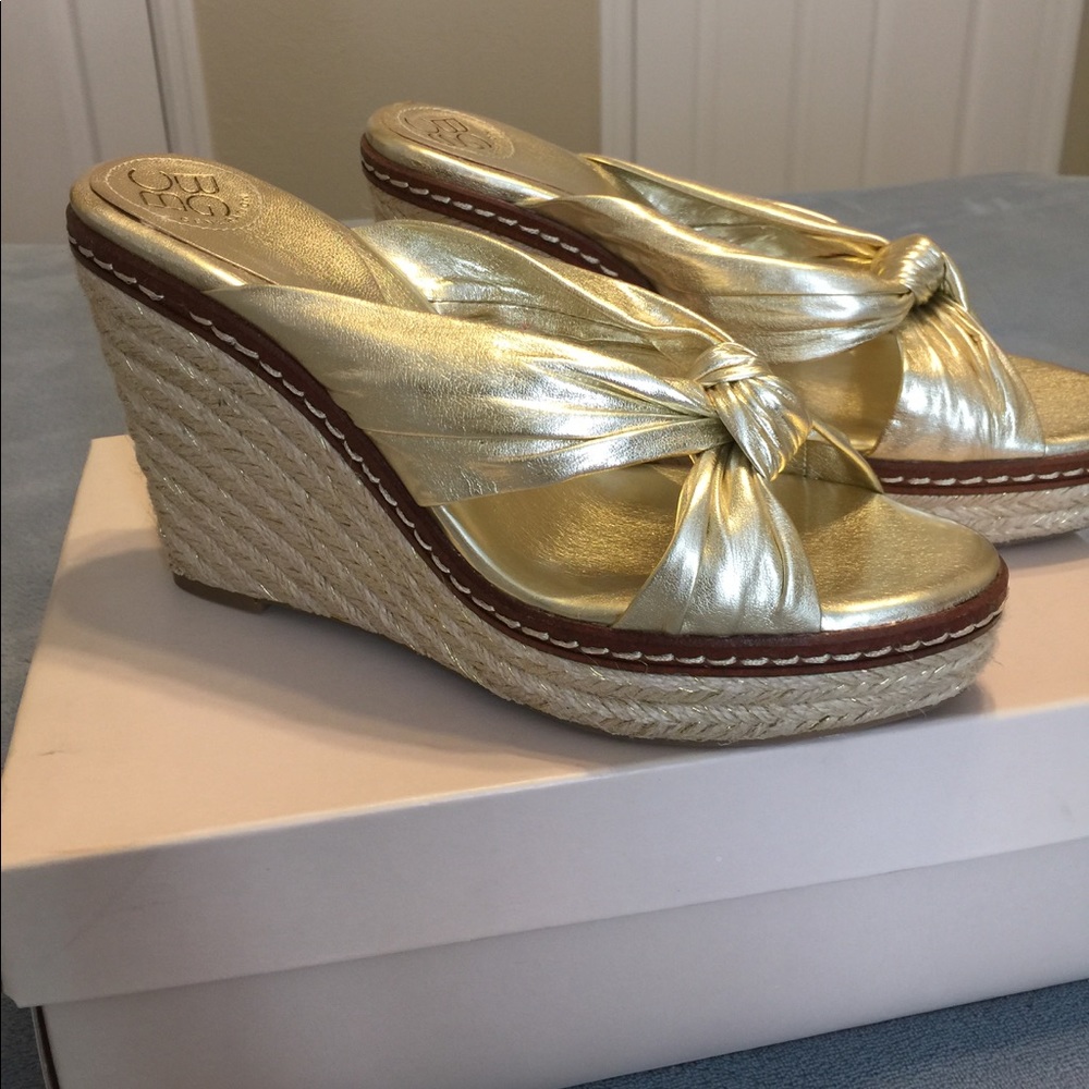 Gold BCBG gold wedge shoe
