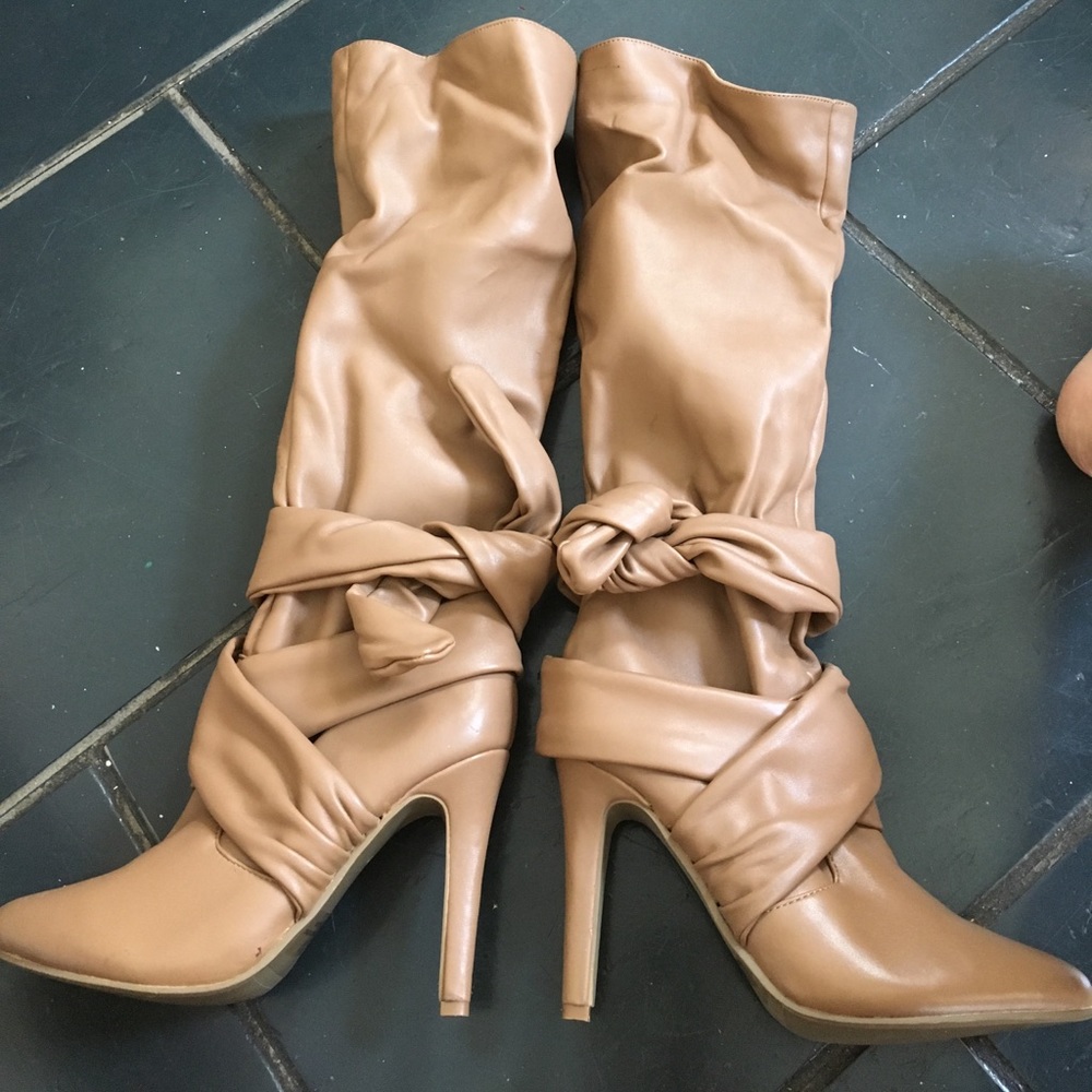 High heel boots, never worn brand new