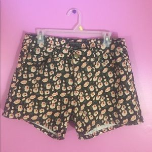 Jean shorts, black denim background