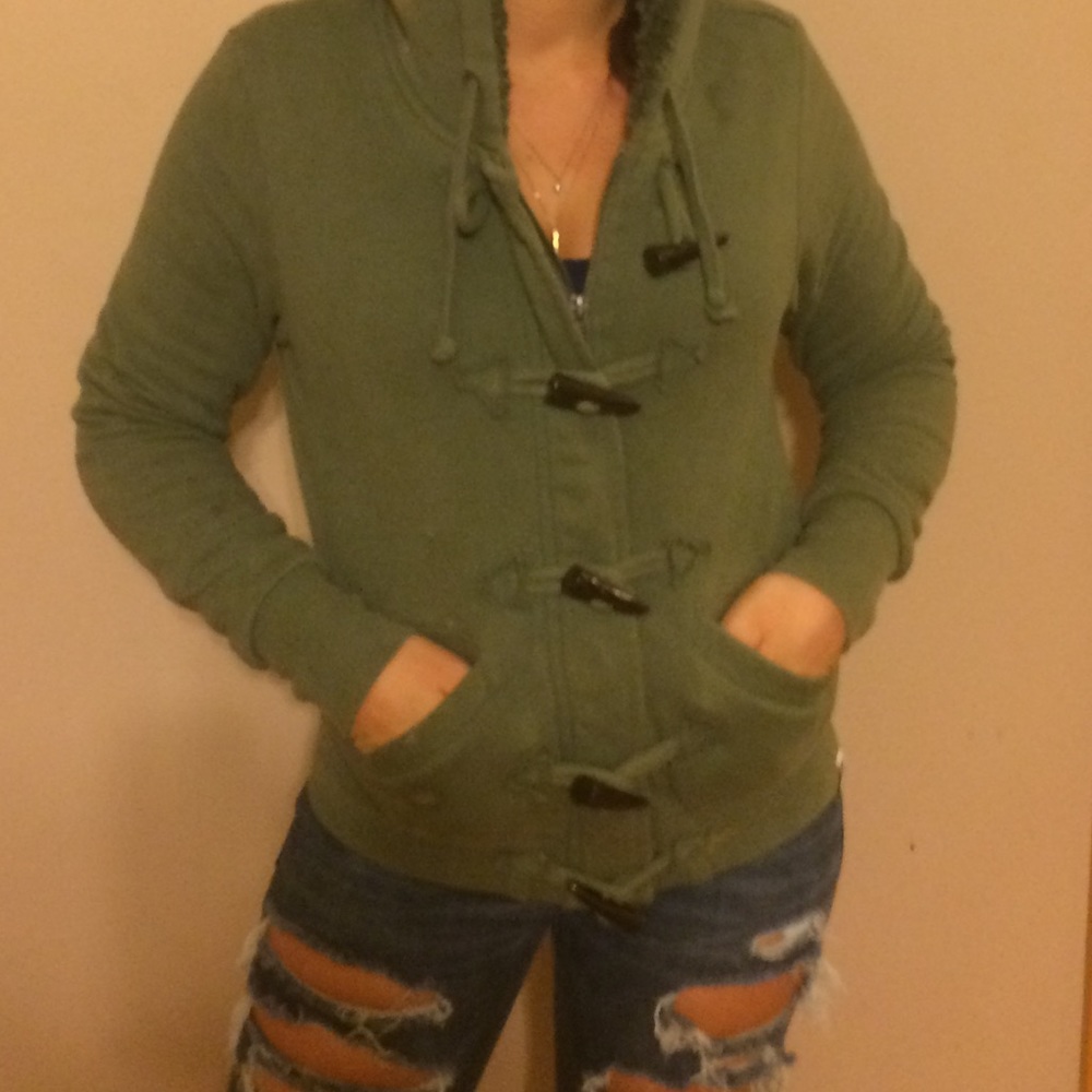 Dark green ROXY zip-up hoodie.