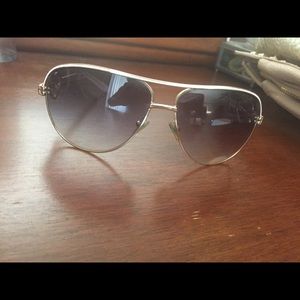 Guess sunglasses - comes with case. Rarely worn.