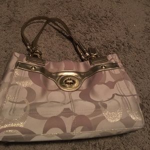 Coach gold logo shoulder bag. Great condition!