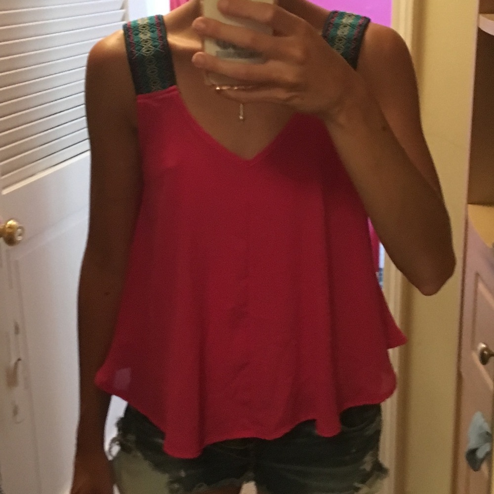 Pink top with tribal sleeves