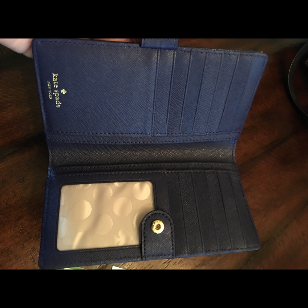 Authentic NWT Kate Spade wallet.